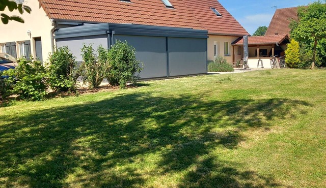 150-square-meter house with space for 3 bedrooms and sleeping arrangements for 8 people. Wooded, fenced-in lot; Veranda