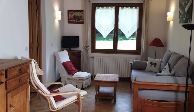 Charming Village Chalet with Garden, Balcony & Mountain Views - Sleeps 2-3, South-Facing